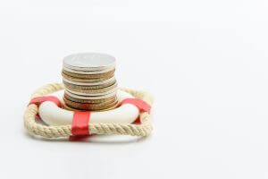 Coins in a life-saving device to illustrate PPP loan forgiveness.