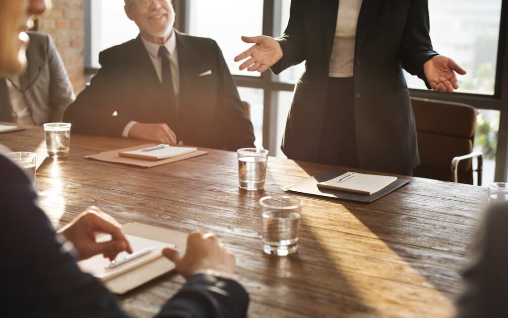 Head of HR meeting with other executives.