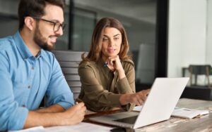 Professionals reviewing a cash flow forecast.