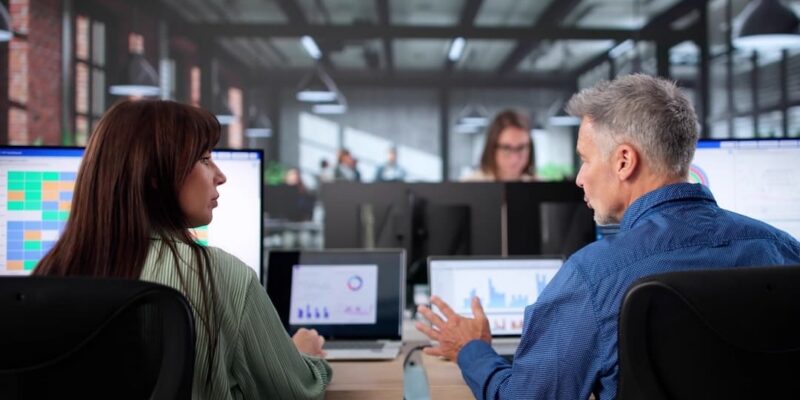 Business people performing an independent quality of earnings analysis.